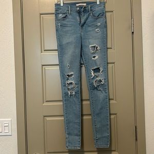 Women’s high-rise super skinny ripped jeans, size 25